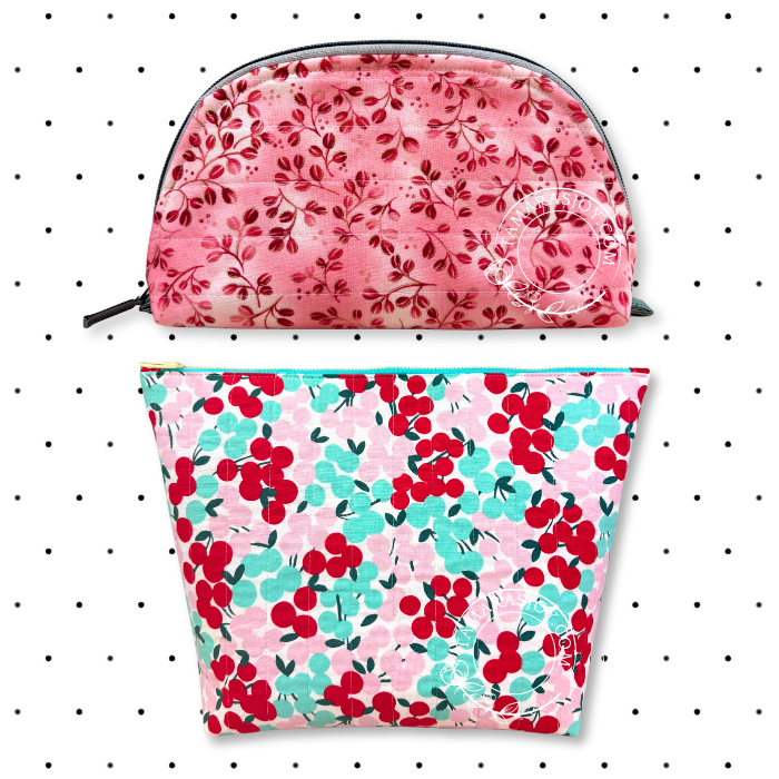 Two floral-patterned pouches on a polka dot background